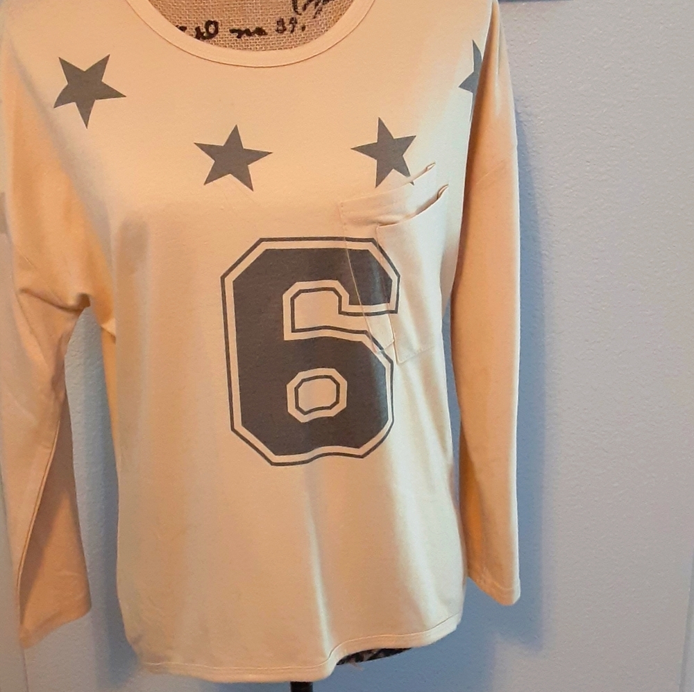 Star #6 sweatshirt in Cream.